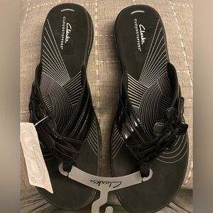 Clarks Black Flip-Flops with Floral Accent